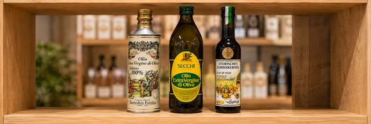 Auswahl hochwertiger Speiseöle im Zuckerfrei Shop mit italienischem Olivenöl von Bartolini und Secchi sowie Steirischem Kürbiskernöl von Lugitsch